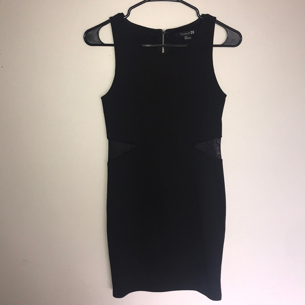 Bodycon black dress.